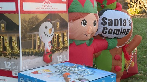 EmVP Family packs lawn with 50 Christmas inflatables